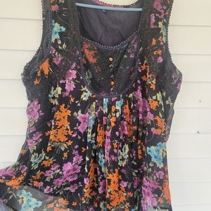 Tank with floral overlay